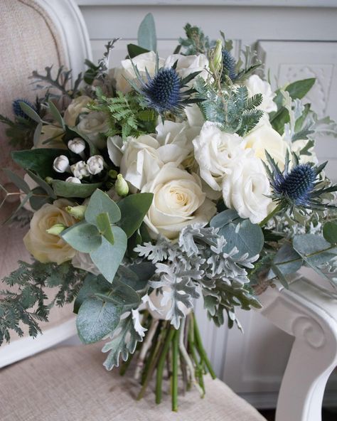 @laurelweddings on Instagram: “Love this winter wedding bouquet design filled with roses, bouvardia, eryngium and wintery foliage #winterwedding #weddingflowers…” February Wedding Flowers, Winter Wedding Flower Arrangements, Winter Wedding Flowers Bouquets, Christmas Wedding Bouquets, Christmas Wedding Themes, Holly Wedding, White Winter Wedding, Winter Wedding Bouquet, Christmas Bouquet