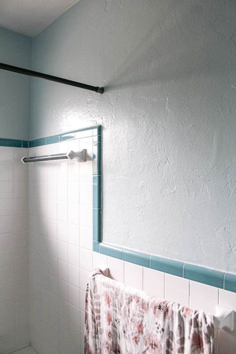 How to Update a Bathroom Without Changing the Tile - at home with Ashley Mauve Bathroom Tile, Old Blue Tile Bathroom, Square Bathroom Tile, 1950s Tile, Vintage Blue Tile Bathroom, Tile Bathroom Walls, Bathroom Tile Shower Ideas, Square Tile Bathroom, Vintage Tile Bathroom