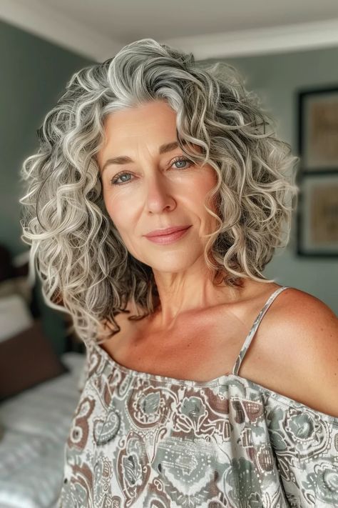 40 Grey Curly Hair Hairstyles to Highlight Your Best Features Medium Length Curly Gray Hair, Curly Grey Hair Over 50, Growing Out Curly Hair, Grey Curly Hair Over 50, Gray Curly Hair Natural Curls, Curly Grey Hair Natural Curls, Curly Gray Hair Over 50, Short Curly Grey Hair, Curly Gray Hair Over 50 Curls