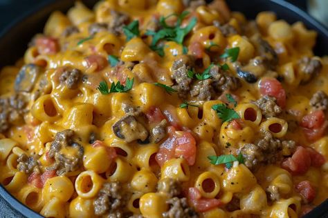 Introduction: If you’re a fan of bold flavors and hearty meals, then Cheesy Beef Taco Pasta is the perfect dish to add to your recipe repertoire. This delightful fusion of ... Learn More Cheesy Taco Pasta Bake, Cheesy Beef Taco Pasta, Cheesy Beef Pasta, Taco Pasta Casserole, Beef Taco Pasta, Mexican Thanksgiving, Easy Taco Pasta, Taco Pasta Recipe, Cheesy Taco Pasta