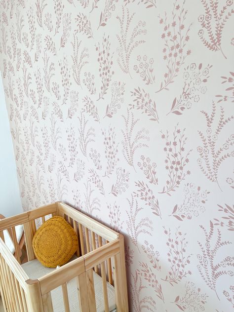 Nursery Wall Stencil Ideas, Flower Stencil For Wall, Pink And White Stencil Wall, Nursery Accent Wall Wallpaper, Stenciled Nursery Wall, Floral Wall Stencil Patterns, Stencil Nursery Wall, Toddler Accent Wall Girl, Baby Girl Accent Wall Nursery