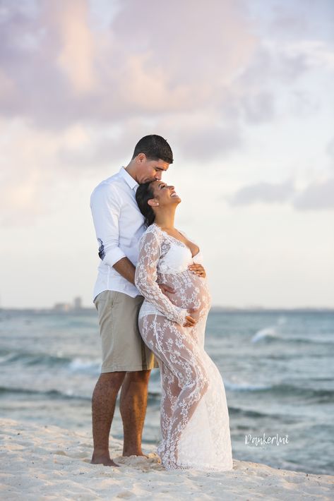 White lace Maternity Dress during a photo shoot on Arashi Beach Aruba White Lace Maternity Shoot, Aruba Maternity Shoot, Maturity Photoshoot On Beach, Maternity White Dress Photo Shoot, White Beach Maternity Shoot, Babymoon Pictures Couple, Maternity Shoot Poses Beach, Beach Maternity Dresses Photo Shoot, White Dress Beach Maternity Shoot