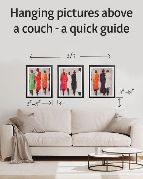 Three frames hung above a couch with measurements. The pictures should be around 2/3 the length of the couch, hung 8-10 inches above a couch, and spaces 2-5 inches apart. Picture Frame Behind Couch, Art Over Sectional Sofa Living Rooms, Pictures Over Sectional Couch, Framed Art Behind Couch, Hanging Pictures Above Sofa, Picture Over Couch Large, Pictures Over The Couch, What To Hang On Wall Behind Couch, Ideas For The Wall Behind The Couch