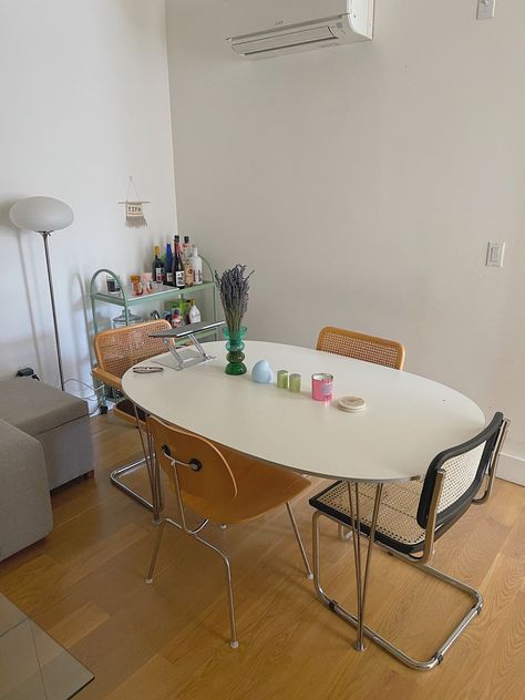 Nyc apartment Fritz Hansen Dining Table with cesca chairs and eames DCM chair, mcm, 70s, vintage table, mid century modern Retro Dinner Tables, Dinner Table Apartment, Mcm Dinner Table, Mismatch Chairs Dining Table, Bauhaus Dining Table, Mismatched Chairs Dining Table, 70s Dining Table, Cesca Chair Dining Room, 70s Interior Design Mid Century Modern