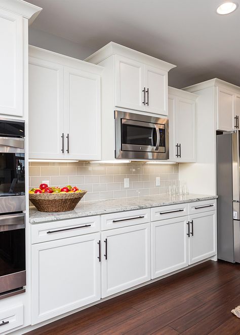 This sophisticated, classic off-white kitchen features Belleair Maple Alabaster cabinets. White Kitchen Appliances, Off White Kitchens, Refacing Kitchen Cabinets, New Kitchen Cabinets, Bright Kitchens, Kitchen Remodeling Projects, White Kitchen Cabinets, Kitchen Area, Kitchen Remodel Idea