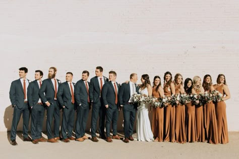 Phoenix Fall Wedding at The Icehouse - arraydesignaz.com Groomsman Terracotta, Terrocata Wedding Flowers, Terracotta Bridesmaid Dress With Groomsmen, Terrocata Color Palette Wedding, Wedding Party Attire Color Schemes Fall, Terracotta Bridesmaid Dresses With Groomsmen, Terracotta Wedding Groomsmen Attire, Burnt Orange Tie Groomsmen, Terracotta Ties Groomsmen