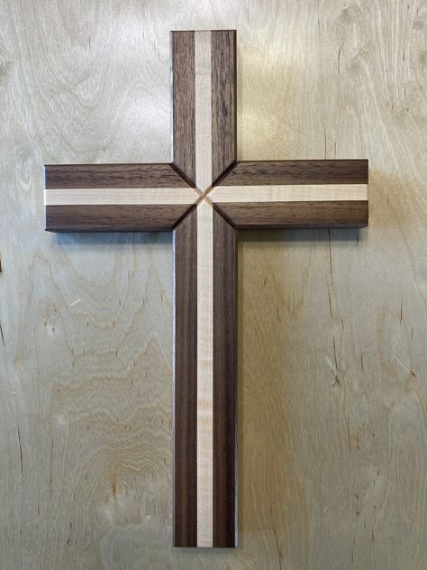 Beautiful handmade wooden wall cross with 2 different species of wood. It's made of Solid Walnut & Maple. This is not your average wooden cross, but rather a very nice collectors piece. The overall dimensions are 10"Wx16"H. The top, bottom, and sides are a thick 2" wide and 1" deep. These crosses are handmade by me and they are made to order. I start by glueing and clamping all pieces in which I let dry for 24 hours. I then plane and sand all surfaces to a smooth finish. The center is a mitered fit with a floating style glued bridle joint for extra strength to last a lifetime. All sides and center have a routered chamfered (beveled) edge followed with three coats of lacquer finish. Keyhole style hanging on the back which will hang with one screw or nail. There is No stain used on the cross Picket Projects, Wooden Crosses Diy, Crosses Diy, Wood Crosses Diy, Handmade Wood Crafts, Wood Wall Cross, Bible Things, Woodworking Projects Furniture, Barn Wood Crafts