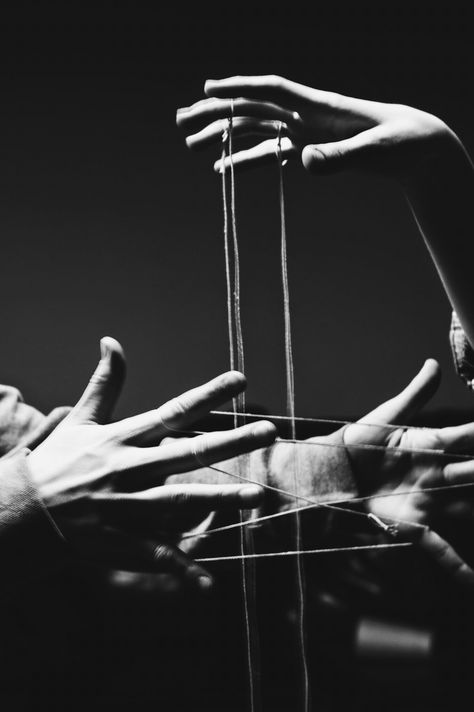 Multiple Hands Photography, Hands Art Photography, Puppet Strings Aesthetic, Chain Illustration Drawings, Hands With Strings, Hand Photography Creative, Hand Holding Puppet Strings, Hands Photography Creative, Intertwined Photography