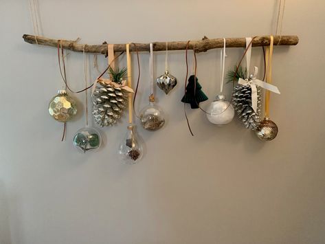 Winter | Christmas decorative wall or door bauble branch with gold, green, silver, white and brown.  A striking way to create a new look and add impact to any wall space this Christmas. 75cm branch included. Christmas Branch Decoration, Branch Christmas Decorations, Branch Christmas Decor, Eco Christmas Decorations, Christmas Decorations Wall, Twig Decor, Xmas Collage, Hanging Christmas Decorations, Eco Christmas