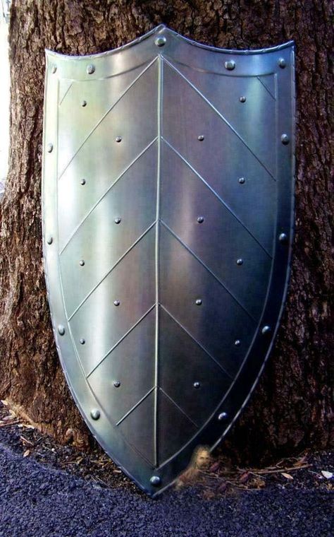 "Medieval Knight Pointed Shield ~ Larp Reenactment Cosplay Heater Shield ~ Functional Armour Knight Battle Shield Handmade Item details: Handmade Materials Steel-18 gauge Overall Length: 30\" (approx) Width: 19.5\" (Approx) Material: 18 Gauge Steel Condition: Brand New Knights Pointed Medieval Crusader Heater Shield 18G Steel LARP SCA This is reproduction item, Not sold as antique. This is a replica of a Medieval Templar Cosplay Heater Shield Steel. It is made of 18 gauge steel and features a ha Knight Battle, Heater Shield, Knight Shield, Medieval Shields, Medieval Knight, How To Iron Clothes, Crusades, Larp, Knights