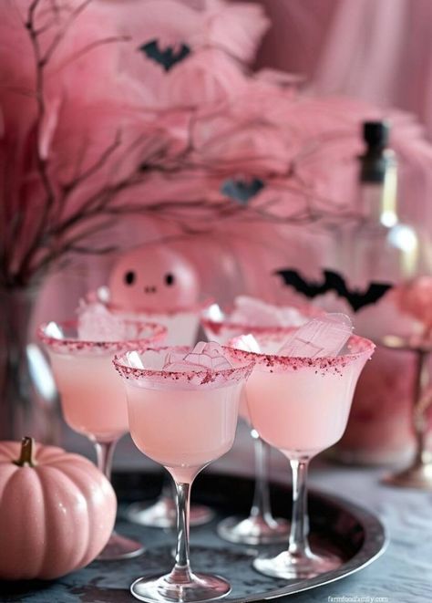 20 Glamorous Pink Halloween Decor Ideas to Refresh Your Fall Look 30 Pink Halloween Cocktails, Girly Halloween Party Food, Pink Halloween Kitchen, Pink Halloween Tablescape, Pink Halloween Drink, Pink Halloween Food, Pink Ghost Party, Pink Halloween Treats, Pink Aesthetic Halloween