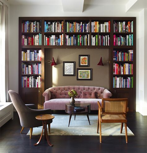 Damon Liss carved this cozy, intimate library nook out of a larger, loft-like space in Tribeca, New York City. The light-filled corner includes armchairs by Kerstin Horlin Holmquist and Pierre Jeanneret, as well as a Martin Eisler coffee table purchased from Espasso. Mid Century Modern Living Room Design, Home Library Rooms, Home Library Design, Mid Century Modern Living Room, Small Room Design, Home Libraries, Family Room Design, Home Library, A Living Room