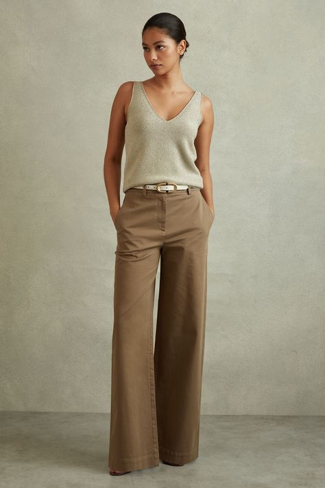 Find REISS Eva Petite Cotton Blend Wide Leg Trousers on Editorialist. The Eva trousers have a wide-leg finish that fit relaxed through the thighs, starting mid-rise on the hips. Their cotton blend fabric offers technical stretch and a soft cargo feel. Cotton blend. Side pockets. Wide leg Wide Legged High Waisted Pants, Travel Trousers Women, Shoes For Cropped Wide Leg Pants, White Wide Leg Pants Outfit Dressy, 40 Style Woman, How To Wear Wide Leg Pants Casual, White Wide Leg Trousers Outfit, Womens Trousers Outfits, How To Dress In Your 40's For Women