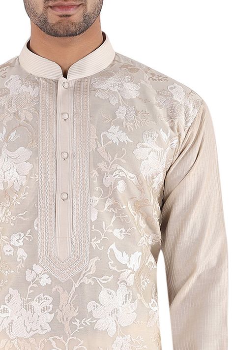 Beige straight kurta with all-over floral motif thread work and buttoned placket. Comes with white churidar. Components: 2 Fabric: Chanderi Neckline: Mandarin Collar Sleeve Length: Full Color: Beige Embroidered Buttoned placket Sleeve stitch lines   - Aza Fashions White Churidar, Stylish Men Wear, Indian Shoes, Chanderi Kurta, Kurta Set For Men, Mens Kurta, Stitch Lines, Straight Kurta, Indian Embroidery