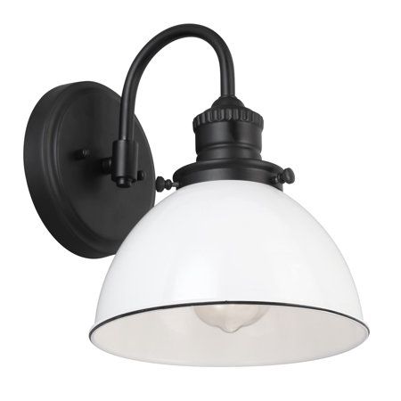 The Design House 588293 Savannah Wall Light features an effortless blend of rustic and modern farmhouse styles. A white metal shade with subtle black trim and a inchshepherdfoots hookinch arm finished in matte black creates an inspired look of simplistic charm. This downlight is designed for a single bulb and is the perfect accent light for your kitchen, hallway, or entryway.The Design House Savannah Wall Light is UL listed and comes with a 10-Year limited warranty that protects against defects Basement Rental, Farmhouse Wall Lighting, Farmhouse Wall Sconces, Rustic Wall Lighting, Sink Lights, Up Down Wall Light, Bronze Sconces, Black Vanity Light, Rustic Wall Sconces