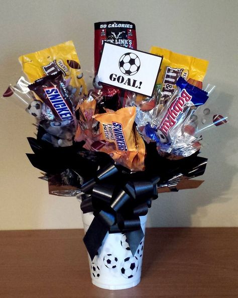 Soccer candy bouquet in a cup for the soccer coach Card Bouquet, Gift Card Bouquet, Soccer Coach Gifts, Candy Arrangements, Senior Night Gifts, Candy Bouquets, Soccer Coach, Soccer Gifts, Senior Gifts