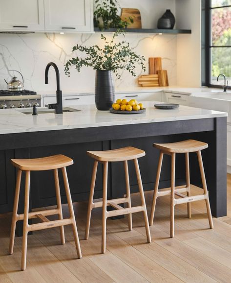 Chatting About Stools — A Buyer’s Guide | Articulate. Esse Stool Saddle Barstools In Kitchen, Bar Stool Wood Design, Bench Stools Kitchen, Wooden Stools For Kitchen Island, Bar Stools Simple, Kitchen Bench Stools, Island Kitchen Stools, Wooden Kitchen Bar Stools, Vintage Counter Stools