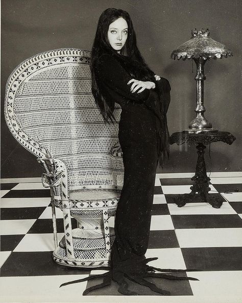 https://flic.kr/p/p7igRy | Morticia A. Addams (née Frump)-1964 | Morticia A. Addams (née Frump)-1964 The Addams Family 1964, Charles Addams, Lily Munster, Gomez And Morticia, Carolyn Jones, Cassandra Peterson, Elvira Mistress Of The Dark, Anjelica Huston, Veronica Lake