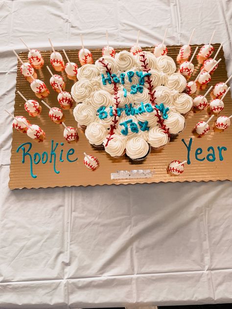 Rookie Year Birthday Pullapart cup cake cake with cake pops Rookie Year Birthday Cake, Rookie Of The Year First Birthday Cake, My Rookie Year First Birthday, Rookie Of The Year First Birthday, Boys First Birthday Party Ideas, Rookie Of The Year, Baseball Theme, Baseball Birthday, Happy Year