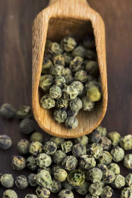 Green Peppercorns | Foodal.com Green Peppercorn, Pine Nut, Green Pepper, Pepper Mill, Lemon Pepper, Ground Pepper, Pine Nuts, Black Peppercorn, Spice Mixes