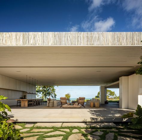 Studio MK27 nests living areas under giant roof of Brazilian beach house Brazilian Beach House, Studio Mk27, Vista House, Modern Tropical House, Casa Patio, Beach House Design, Seaside Towns, Indoor Outdoor Living, Contemporary Architecture