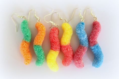 Sour Gummy Worm Earrings, Sour Worm Earrings, Candy Earrings, Polymer Clay Candy, Food Earrings, Fake Food Jewelry, Dangle Earrings, Kawaii This is a sweet pair of fake sour gummy worm earrings made of polymer clay and decorated with fake sugar on top. *Size of gummy worm: about 5 x 1,50 cm *Material: Polymer Clay *Metal Material: Silver Plated Earring Hooks ➜Note: All items are handmade so they might have slight variations from the pictures. Because of their handmade nature all items should be Worm Earrings, Silly Earrings, Sour Gummy Worms, Gummy Worm, Crazy Earrings, Clay Candy, Candy Food, Candy Earrings, Funny Jewelry