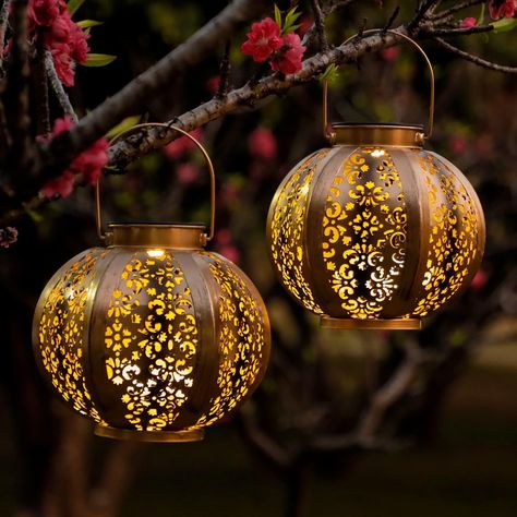 Why give up beauty for practicality? The OxyLED moroccan solar lanterns for the garden are retro, elegant and effective. The solar light provides some much-needed illumination, casting gorgeous, whimsical pattern. It’s a great decorative touch for gardens, backyards, driveways, pathways, and even camping. #ad Solar Garden Lanterns, Solar Lantern Lights, Solar Lanterns Outdoor, Hanging Solar Lights, Solar Powered Lanterns, Outdoor Garden Lighting, Outdoor Lantern, Outdoor Hanging Lanterns, Garden Lanterns