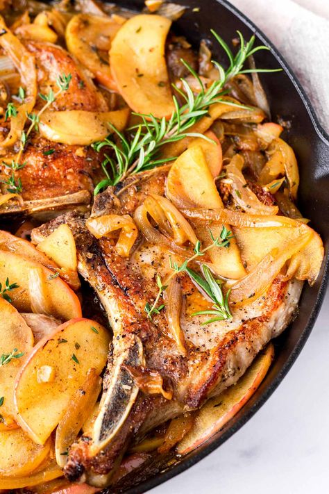 Pork Chops with Apples! These skillet apple pork chops are perfect for fall. It's the perfect balance between sweet and savory. The pork chops are juicy, and the apples and onions are tender. Pork And Apple Recipes, Apple Pork Chop Recipes, Pork Chops With Apples, Apples And Onions, Pork Dinners, Skillet Pork Chops, Macro Recipes, Pork Entrees, Weekly Recipes