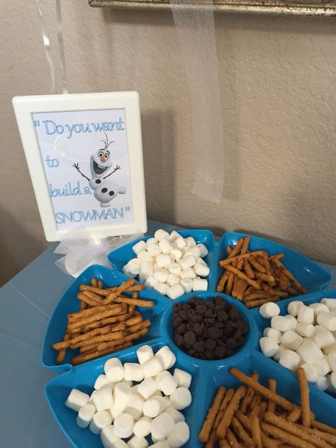 Elsa Food Ideas Disney Frozen Birthday, Frozen Themed Dinner Ideas, Marshmallow Olaf Build A Snowman, Cheap Frozen Birthday Party, Do You Want To Build A Snowman Snack, Frozen Party Treats Ideas, Elsa Birthday Food, Disney Frozen Themed Food, Elsa Themed Birthday Party Food Ideas