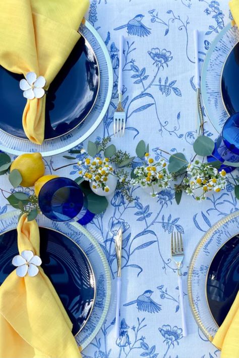 Are you planning a blue and yellow garden party and want to achieve an authentic Victorian feel? Look no further than your table setting! In this article, we provide tips on using Victorian tableware. We also offer suggestions for adding floral arrangements and ribbons to complete the look. By following these simple steps, you can create a beautiful and practical table setting that is sure to impress your guests and transport them back in time to the Victorian era. Blue Yellow Decorations Party, Blue And Yellow Tablescapes, Blue And Yellow Birthday Party Decor, Blue And Yellow Table Setting, Yellow And Blue Party, Blue And Yellow Garden, Yellow Garden Party, Victorian Table Setting, Yellow Birthday Parties