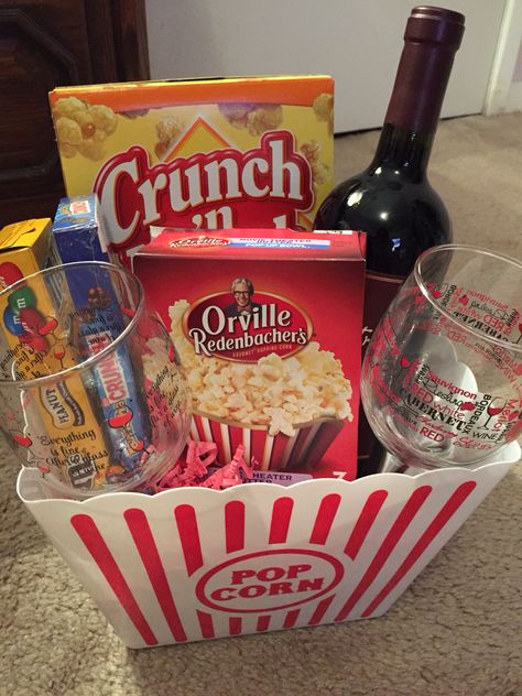 Movie night basket! Gift basket ideas, Christmas gift too Couples Movie Night Gift Basket, Movie Date Basket Ideas, Fun Raffle Ideas, Date Night Basket Ideas Couple, Date Night Gift Basket Ideas Couples, Movie Basket Ideas, Movie Night Basket Ideas, Movie Gift Basket Ideas, Couples Gift Basket Ideas