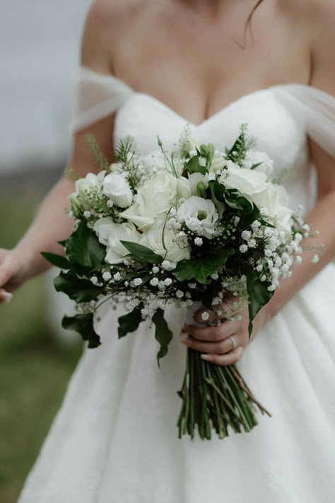 Hand-tied Bridal Bouquet in cool whites and dark green designed by Justine, Oban Florist, The Thistle & The Rose White Bride Flower Bouquet, Dark Green Wedding Flowers Bouquets, White And Green Hand Tied Bouquet, Dark Green Flowers Wedding, All White And Green Bouquet, White And Green Simple Bouquet, Wedding Bouquets White And Green Simple, Understated Bridal Bouquet, Flowers For Dark Green Wedding