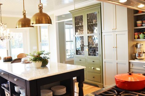 Life in Grace. Fab kitchen. Love the mix of colors in cabinetry, wood floors, sideboard and how the dishes are in the island. Creamy Cabinets, Life In Grace, A Kitchen, Stove, Wood, Green