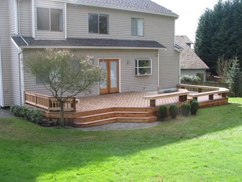 Trex deck and benches in Kirkland Deck With Partial Railing, Deck Off Back Of House Farmhouse, Deck Ideas New Zealand, Small Backyard Decks, Patio Deck Designs, Outdoor Deck Furniture, Deck Designs Backyard, Wrap Around Deck, Deck Designs