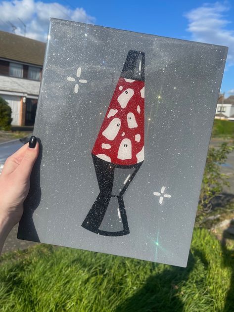 Introducing the Resin Ghost Lava Lamp Canvas, a hand-painted masterpiece coated in resin for a lasting finish. Perfect for fans of all things spooky , this unique piece of home decor is a true labor of love. Add a touch of character to your space today! Dimensions : 11inches x 14 inches (0.25 inches thick) What To Paint On A Canvas Aesthetic, Ripped Canvas Painting Ideas, Halloween Crafts For Families, Cricut Crafting Ideas, Painting On Wood Pieces, Spooky Paint Night Ideas, Cool Easy Art Projects, Nice Easy Paintings, Small Canvas Gift Ideas