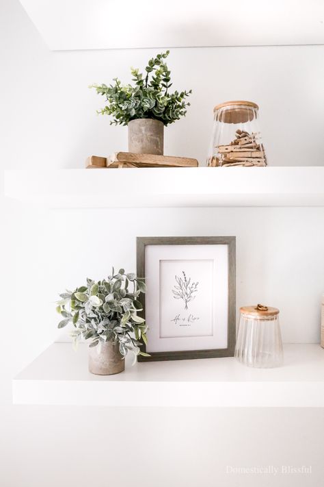 Laundry Room Floating Shelves - Domestically Blissful | Laundry Room. | Shelves. | Floating Shelves. | DIY Floating Shelves. | Simple Decor. | Decorative and Useful. | Functional and Beautiful Shelves. | Home. | Inspirational. | Clean White. | Simple Laundry Room Decor. | Home Decor. | Home Inspiration. | Home Tutorial. | Laundry Room Shelves. | White Floating Shelves. | Easy Laundry Room Shelves. | Decor and Function. | Organization. | Home Ideas. | Laundry Room Decor Ideas. | DIY Shelves. | Laundry Floating Shelves, Laundry Room Shelf Decor, Hanging Wall Organizer, White Laundry Rooms, Floating Shelf Decor, Laundry Room Shelves, White Floating Shelves, Dream Laundry Room, Floating Shelves Diy