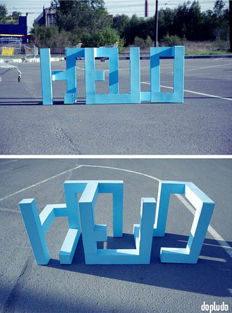 'In this clever work by Dopludo Collective, three-dimensional shapes that stand up on their own in a parking lot reveal themselves to be a word when viewed from a certain angle. Text Sculpture, Typographic Installation, Text Installation, Street Typography, Perspective Design, Graffiti Tags, Guerrilla Marketing, 3d Type, Dimensional Shapes