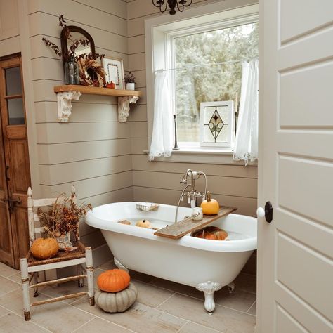 Vintage Tub & Bath on Instagram: “Wendy from @lhsimpleliving transformed her farmhouse bathroom into a fall-inspired haven. An antique wooden chair, the Windsor Clawfoot…” Farmhouse Clawfoot Tub Bathroom, Bathroom With Clawfoot Tub, Clawfoot Tub Bathroom, Antique Wooden Chairs, Vintage Tub, Meet New Friends, Happy Pumpkin, Classic Farmhouse, Rustic Home Design