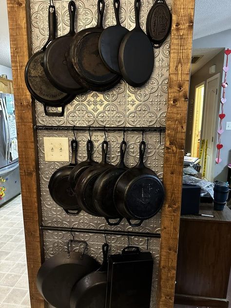 Cast Iron Hunting & Identification | I finally got around to building the storage wall my wife wanted | Facebook Cast Iron Rack Wall, Cast Iron Skillets On Wall, Cast Iron Cookware Storage, Cast Iron Skillet Wall Hanger, Display Cast Iron Skillets, Cast Iron Skillet Display Ideas, Cast Iron Wall Storage, Storing Cast Iron Cookware, Cast Iron Pan Wall Display