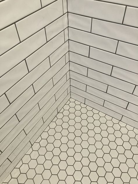 White Hex Shower Floor, White Hexagon Tile Bathroom Floor Shower Subway On Walls, White Hexagon Black Grout, White Hexagon Tile Bathroom Black Grout, White Hexagon Tile With Black Grout, Retro Shower Tile, Black Grout Shower Tile, White Subway Tile Shower Black Grout, White Hexagon Tile Black Grout