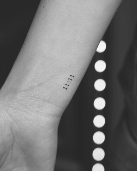 Tattoo of the angel number "11:11" located on the 111 Tattoo Wrist, Number 11 Tattoo Ideas Fonts, 111 Fine Line Tattoo, 1111 Angel Number Tattoo, Minimalist Tattoo 11:11, Dainty 11:11 Tattoo, Fine Line 11:11 Tattoo, Tiny Number Tattoo, Tattoo 11:11 Number