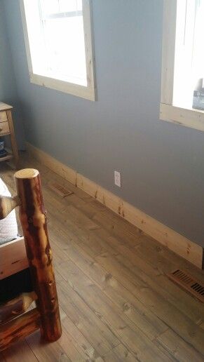 Natural pine baseboards and trim.                                                                                                                                                                                 More Knotty Pine Baseboards And Trim, Rustic Wood Baseboards, Natural Baseboards Wood Trim, Natural Pine Trim, Pine Trim And Baseboards, Raw Wood Trim Interior, Raw Wood Trim, Cedar Baseboards, Pine Baseboards And Trim