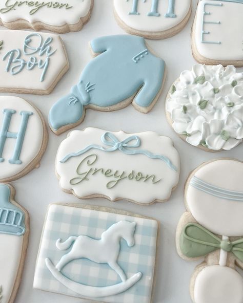 Everything about this checks my favorites list 🤩 the shade of blue, the monogram, the gingham, the ribbon, the hydrangea just yessss!! 🤍 #babyshowercookies #babycookies #babyboycookies #boybabyshowercookie #babyboycookies #babyboy #babyshower #customcookies #cookiesofinstagram #cookies #royalicing #royalicingcookies #dfwcookies #dfwcustomcookies #dfwparties #argyletx #colleyvilletx #southlaketx #flowermoundtx Boy Baby Shower Cookies Decorated, Vintage Blue Baby Shower Ideas, Blue Bow Baby Shower Theme, Green And Blue Baby Shower Ideas, Blue Gingham Baby Shower Ideas, Blue And Green Baby Shower Ideas, Gingham Baby Shower Ideas, Light Blue Baby Shower Ideas, Blue Baby Shower Cookies