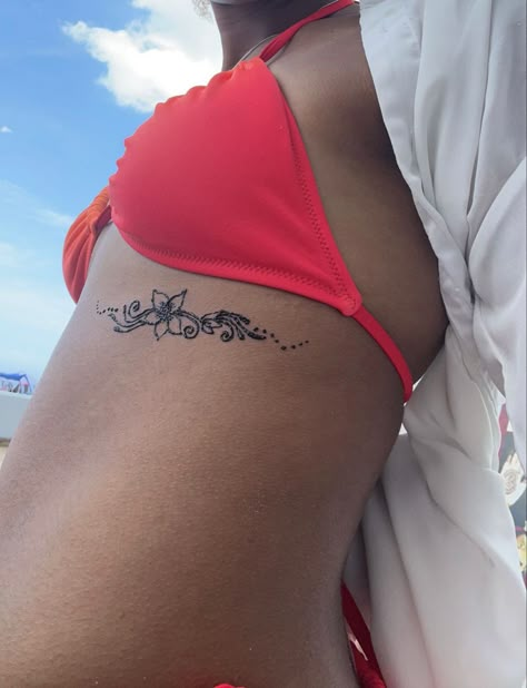 Lower Back Ocean Tattoo, Ocean Lower Back Tattoo, Henna Designs Tramp Stamp, Feminine Hawaiian Tattoos, Unique Tramp Stamp Tattoo Ideas, Summer Themed Tattoos, Beach Aesthetic Tattoo, Hibiscus Lower Back Tattoo, Waistband Tattoo