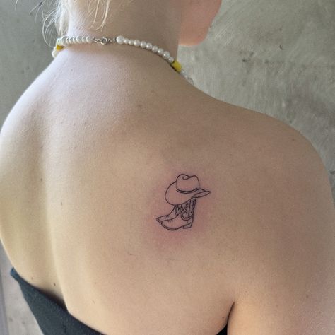 Boot Tattoo Placement, Cowboy Boot With Hat Tattoo, Dainty Southern Tattoos, Cowprint Cowboy Hat Tattoo, Cowboy Boot Stamp Tattoo, Cowboy Boots With Hat Tattoo, Cowboy Hat Finger Tattoo, Cowboots Tattoo, Pink Cowboy Hat Tattoo