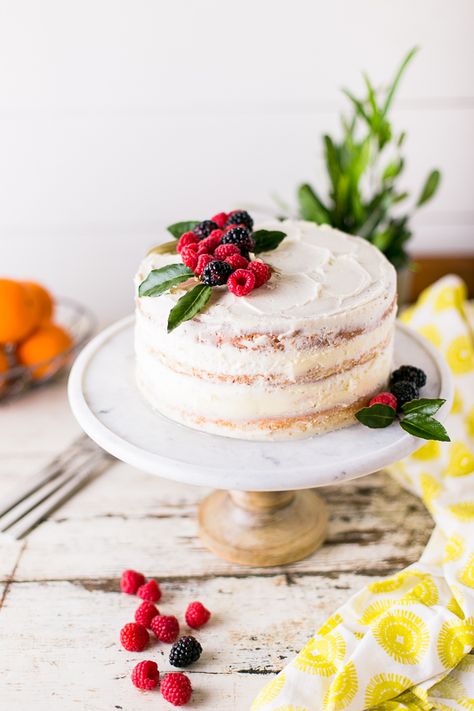 A delicious white cake recipe that is easy to bake and assemble. The addition of jam between the layers makes this the perfect Holiday cake recipe. #foodblogger #cakerecipe #scratchcake #baking Cake With Jam, Holiday Cake, Sour Cream Cake, Cake Recipes From Scratch, Rustic Cake, Tampa Wedding, Sweet Cake, Box Cake Mix, Just Cakes