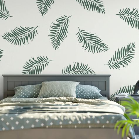 Minimalistic art, geometric patterns, and simple, functional accessories. Decorations Drawing, 2023 Home Interior, Leaf Wall Stencil, Modern Wall Stencil, Wall Stencil Designs, Modern Living Room Design Ideas, Room Makeover Ideas, Palm Leaf Pattern, Stencil Wall Art