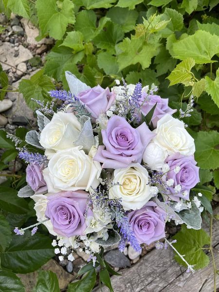 Lavender Roses, Baby Breath, White Roses, Dried lavender makes up this wedding bouquet Lavender And Roses Bouquet, Bride Bouquets Lilac, Light Purple And White Flower Bouquet, White And Purple Bridal Bouquet, White And Purple Flower Bouquet, Lavender White Wedding, Pastel Purple Flowers, Destiny Wedding, Purple Roses Wedding