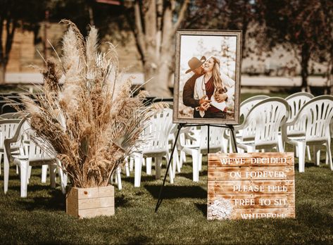 Boho wedding decor, ceremony aisle entry Isle Entry Decor Wedding, Western Wedding Signs Diy, November Backyard Wedding Ideas, Western Wedding Entrance, Outdoor Ranch Wedding Decor, Ceremony Entry Decor, Cow Hide Wedding Aisle Runner, Boho Western Wedding Ceremony Decor, Saddle Wedding Decor