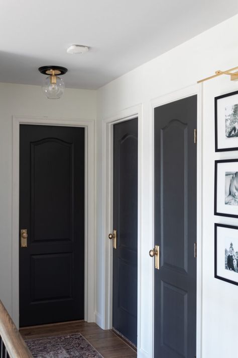 White House With Black Trim Interior, Black Door Hallway Decor, Small Hallway With Doors, Black Hallway Doors White Trim, Hall With Black Doors, Blue Interior Doors Hallways, Hallway All One Color, Dark Door Hallway, Black Beadboard Hallway